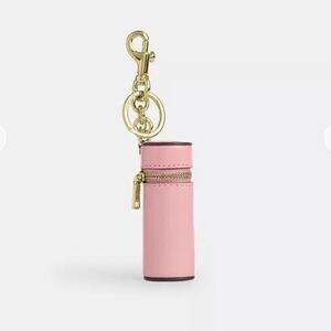Coach lipstick case bag charm